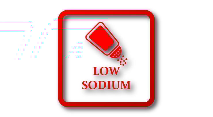 Red sign showing salt shaker stating low sodium.